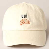 Oui Croissant Baseball Cap
