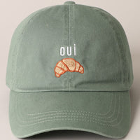 Oui Croissant Baseball Cap