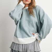 Blue and Ivory contrast-trim relaxed knit sweater, front view on model