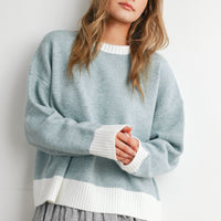 Blue and Ivory relaxed knit sweater, front close view