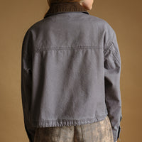 Denim Blue cropped utility jacket, back view on model