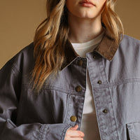 Denim Blue utility jacket with corduroy collar and button front, close-up