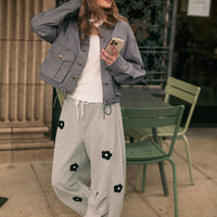 Denim Blue cropped utility jacket styled outdoors, full-length view