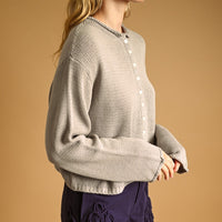 Aurora Grey knit cardigan, side view on model