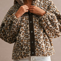 Leopard sherpa jacket with contrast placket, collar detail on model