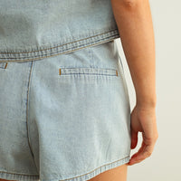 Women’s Light Wash Denim Pleated Shorts