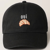 Oui Croissant Baseball Cap