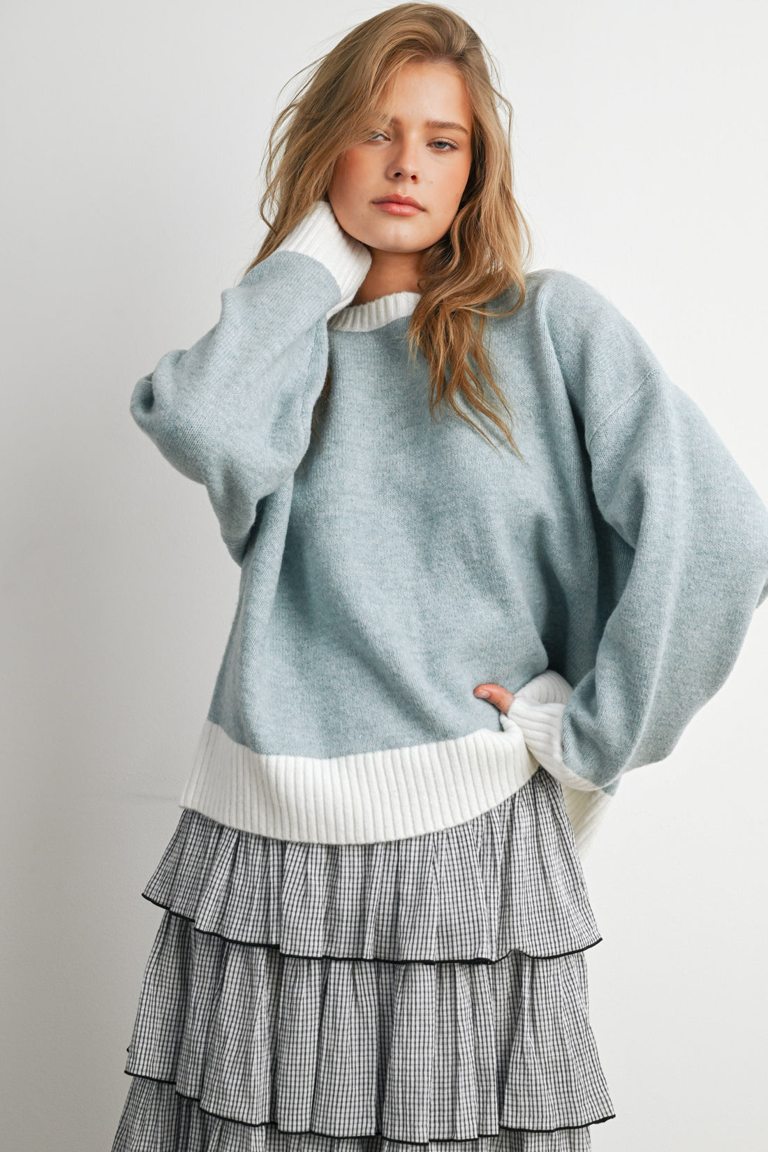 Blue and Ivory contrast-trim relaxed knit sweater, front view on model