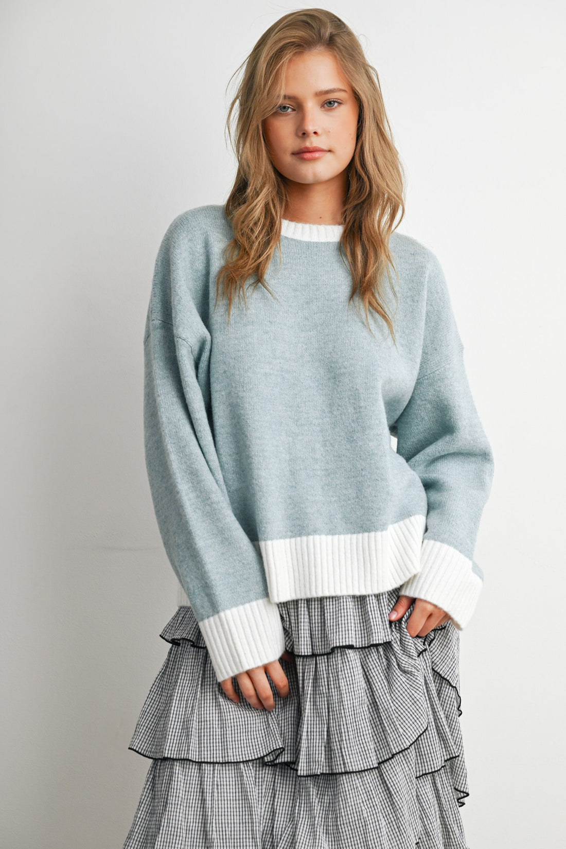 Blue and Ivory contrast ribbed trim sweater, straight front view on model
