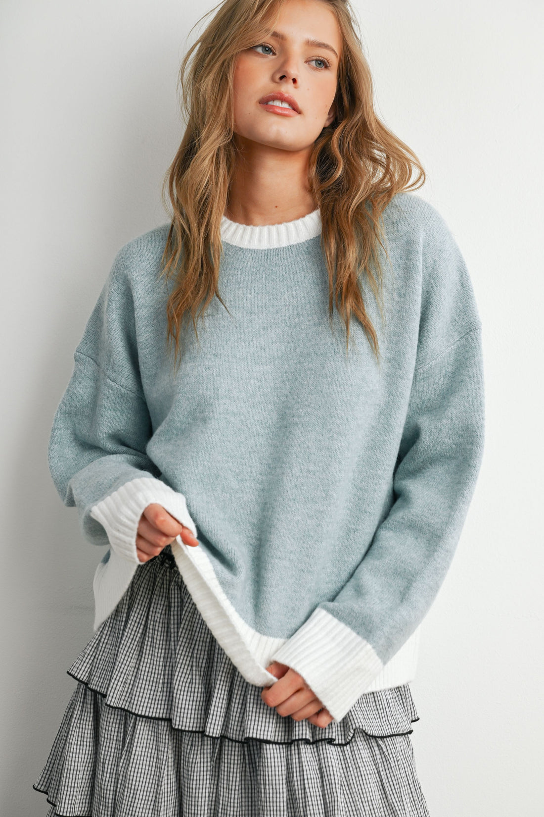 Blue and Ivory contrast-trim knit sweater, front pose on model