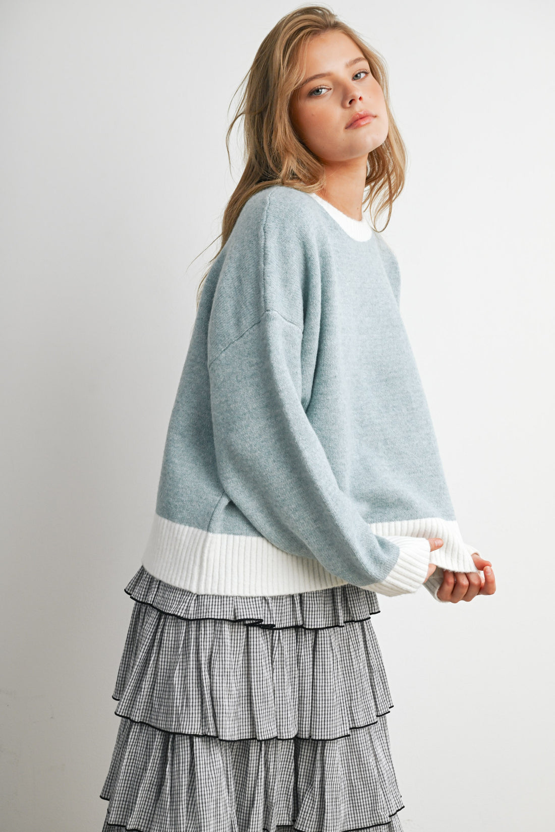 Blue and Ivory relaxed knit sweater, three-quarter back view