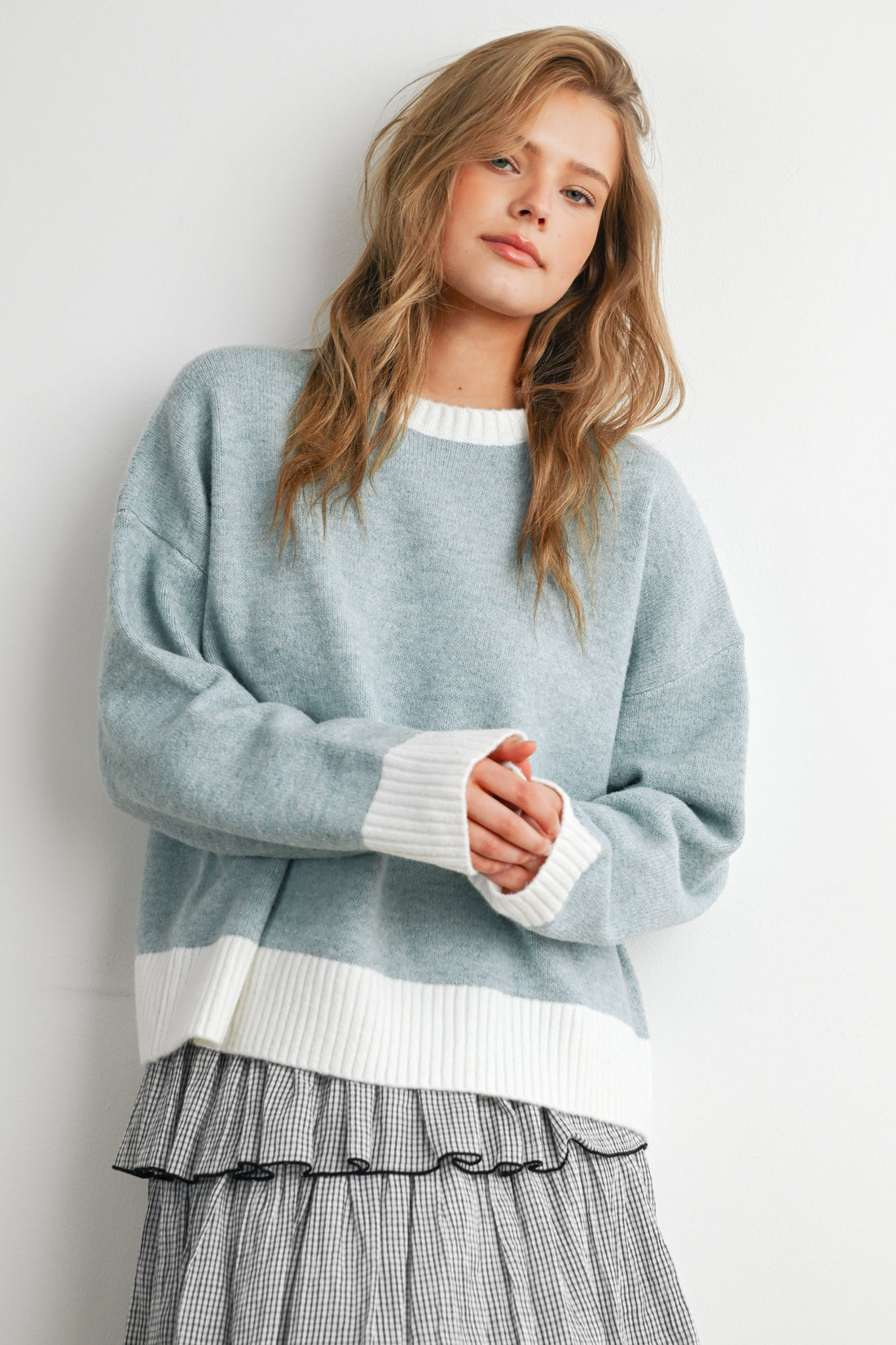 Blue and Ivory relaxed knit sweater, front close view