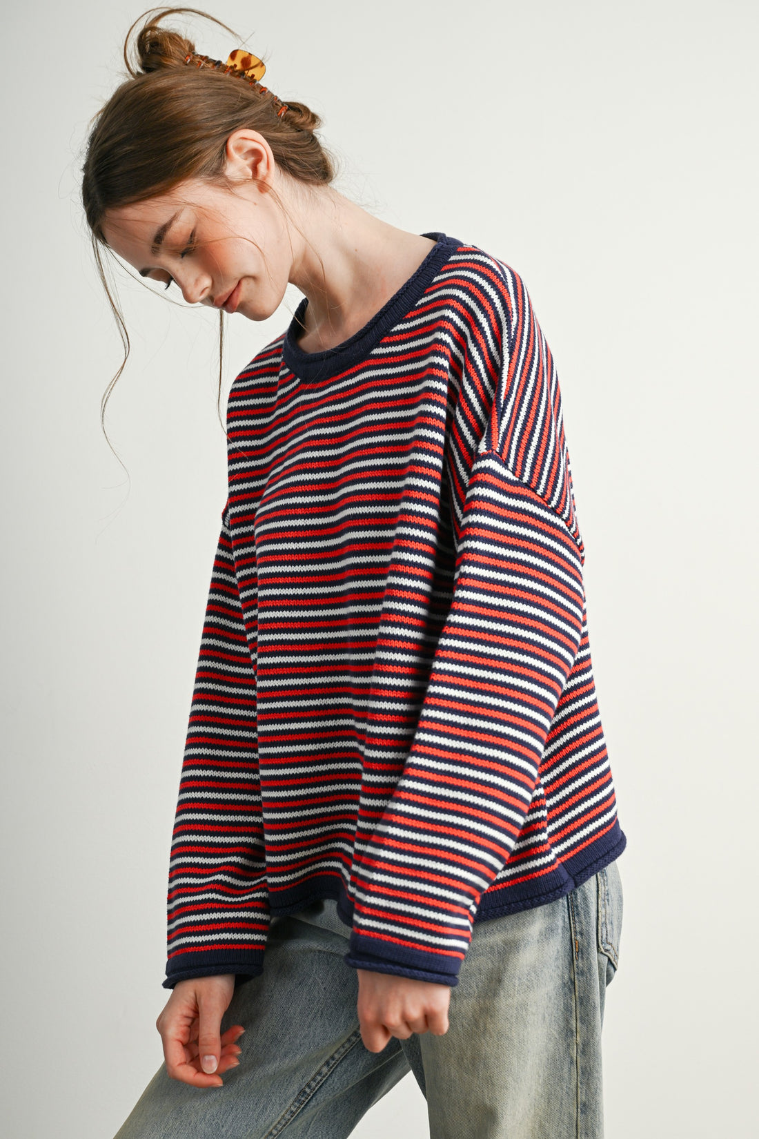Navy Multi striped sweater with drop shoulders, side pose
