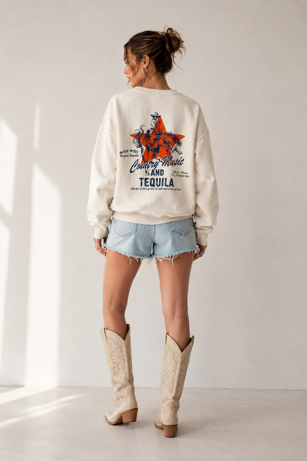 Wild West graphic sweatshirt, full-length back view on model