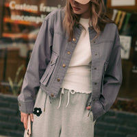 Denim Blue contrast-collar utility jacket styled outdoors, angled front view