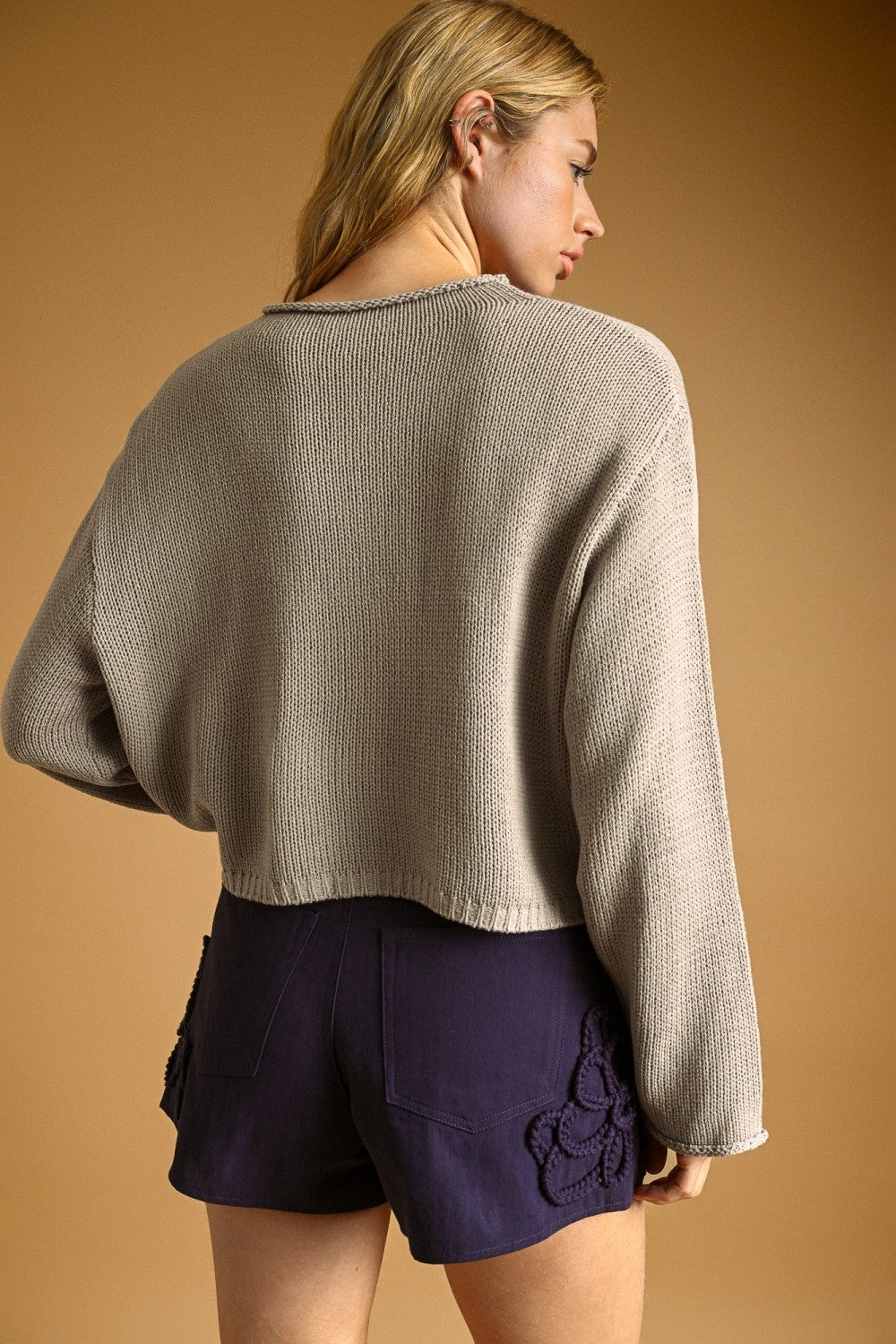 Aurora Grey knit cardigan, back view on model