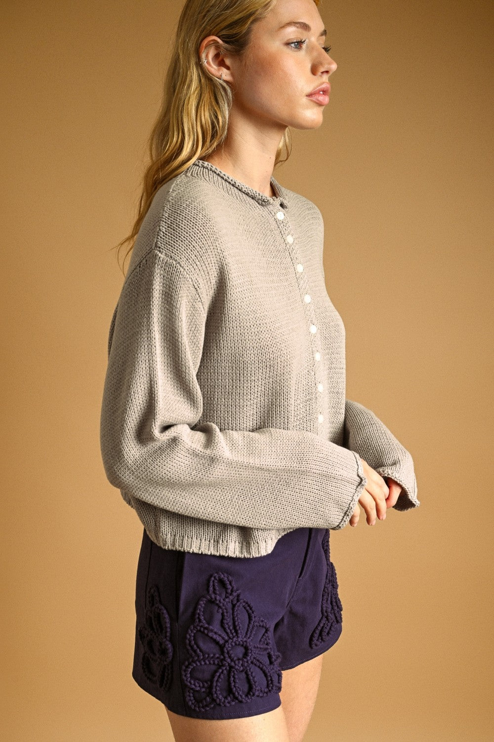 Aurora Grey knit cardigan, side view on model