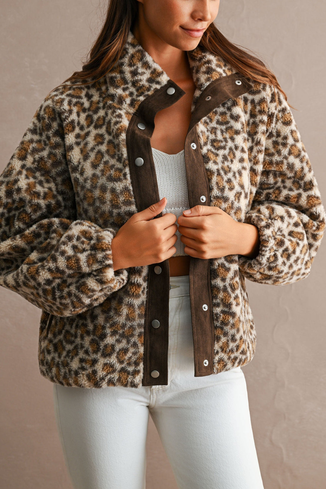 Leopard sherpa funnel neck snap jacket, front open view on model