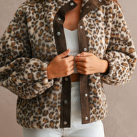 Leopard sherpa funnel neck snap jacket, front open view on model