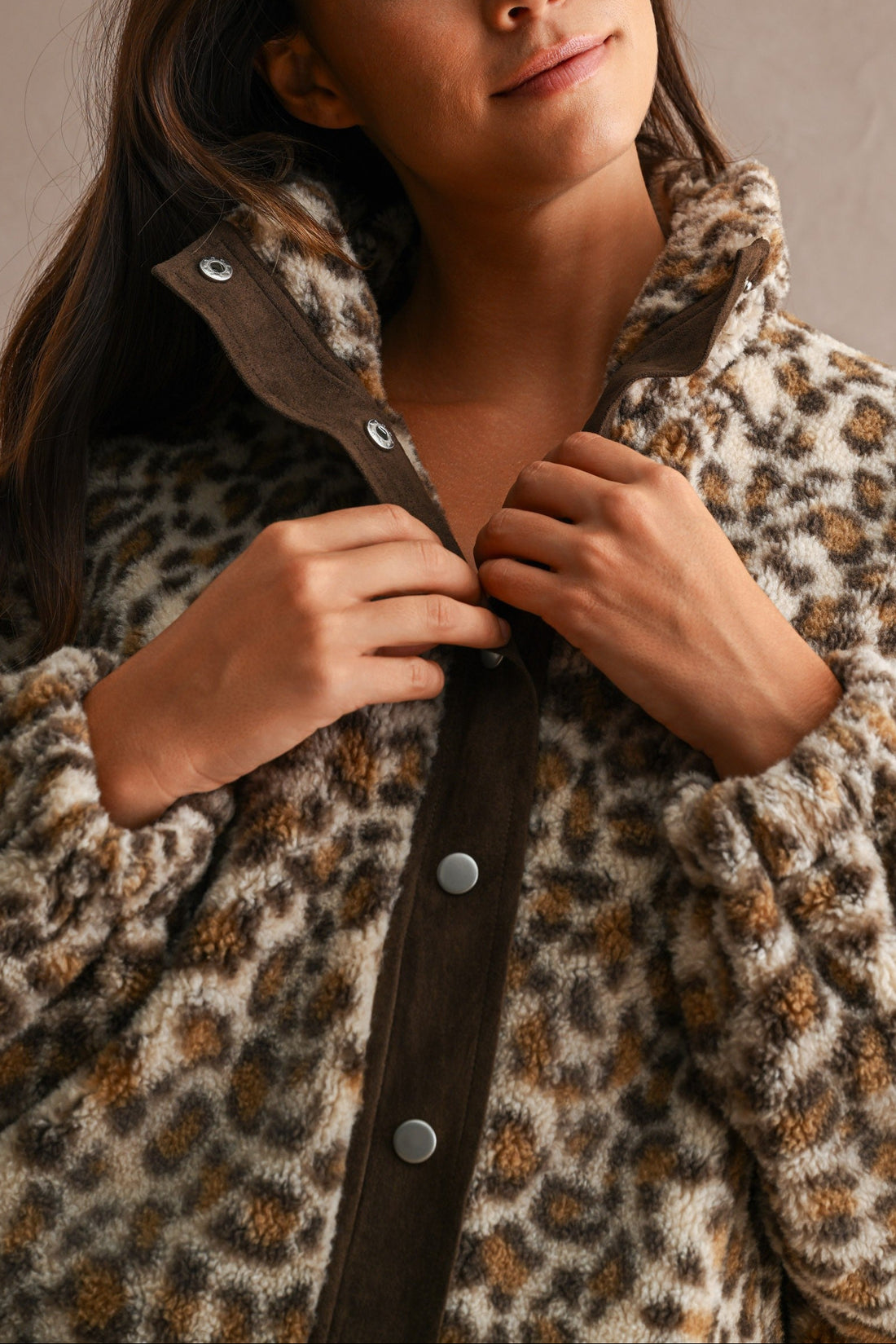 Leopard sherpa funnel collar and contrast placket, close-up