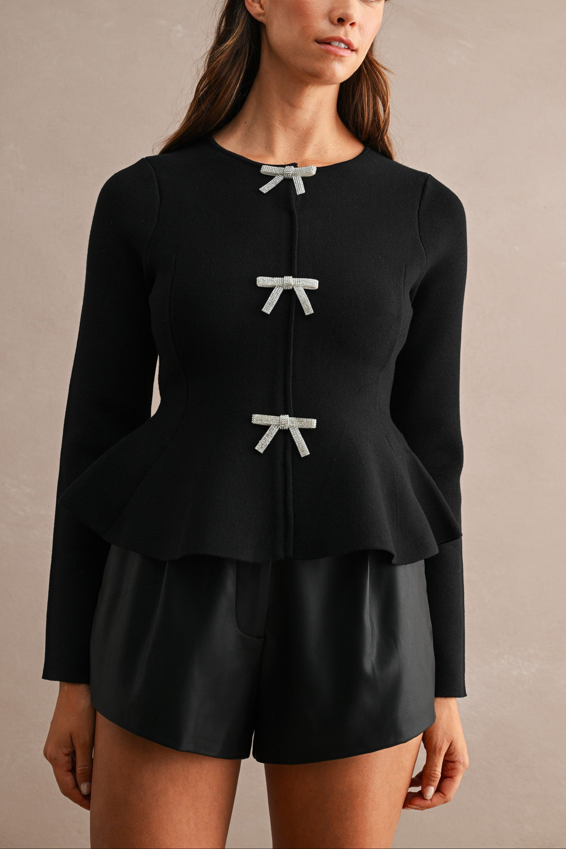 Jewel Bow Peplum Knit Top